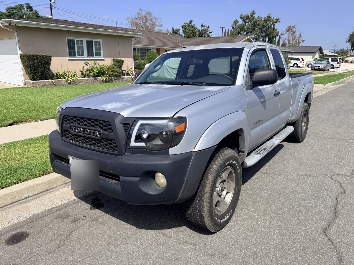 Silver Toyota Tacoma TRD Off-Road pickup, front three-quarter view
