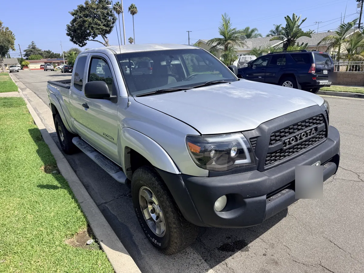 Silver Toyota Tacoma TRD Off-Road pickup, side view