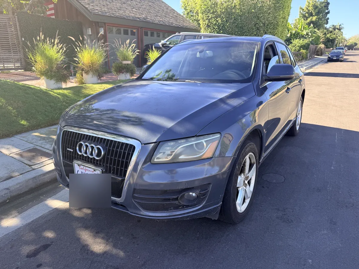 Gray Audi Q5 SUV, front three-quarter view