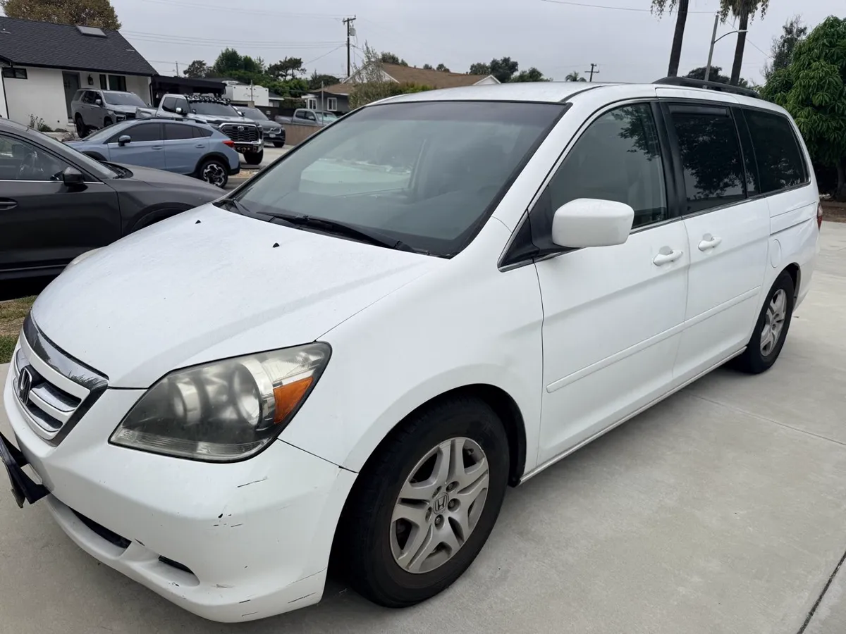 White Honda Odyssey, front three-quarter view